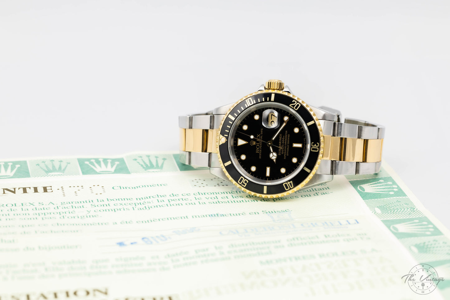 Rolex Submariner 16613 SS/Gold Black Dial
